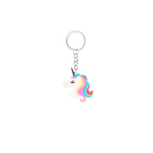 Close-up detail shot of the colorful unicorn metal keychain pendant with vibrant mane.