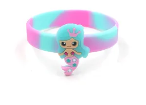 Charming mermaid silicone bracelet with colorful swirl design, cute cartoon charm for kids.