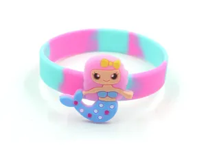 Closeup view of the colorful silicone bracelet featuring a cute cartoon mermaid charm design.