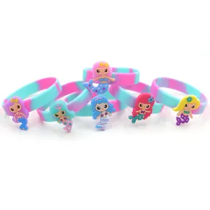 Colorful silicone mermaid bracelets set, cute cartoon designs, ideal for kids party favors.