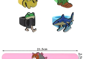Bizarre cartoon PVC ring and slap bracelet set, quirky animal shape design for daily fun.