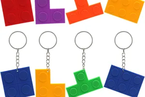 Colorful PVC soft brick keychains detail view, featuring geometric interlocking block rings design.