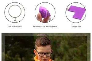Detailed view of the PVC soft building block keychain showing ring buckle, elasticity, and back.