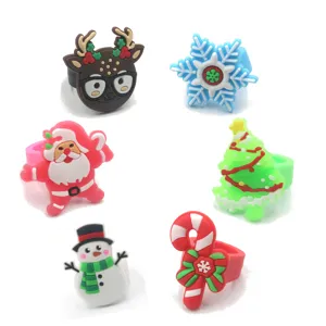 Christmas silicone rings set for kids party gifts, featuring cute cartoon festive holiday designs.