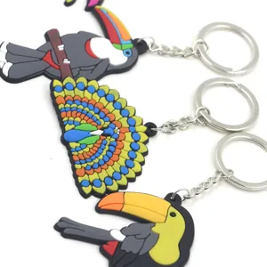 Joli ensemble de porte-clés toucan et paon en caoutchouc PVC, pendentif en métal.