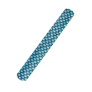 Detailed view of blue mermaid scale print PVC slap bracelet, perfect for party favors and gifts.