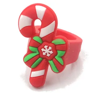 Close-up detail of the Christmas candy cane ring, featuring cute snowflake bow design.