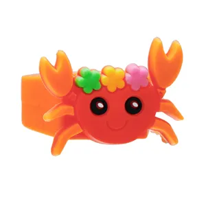Detailed view of cute cartoon crab ring, colorful PVC soft rubber children toy ring design.