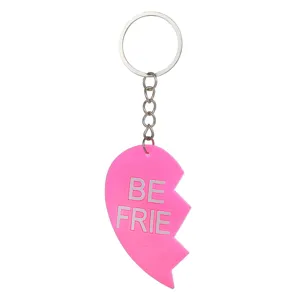Close-up detail of the pink PVC heart keychain pendant showing smooth texture and metal ring.