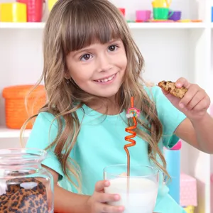 Colorful rainbow cloud curly straw detail shot, fun plastic drinking straw for kids parties.