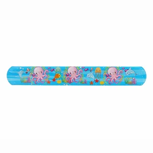 Detail view of cute cartoon marine animal print PVC slap bracelet party toy wristband.