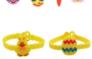 Osterparty Spielzeug Detailansicht mit bunten Silikon Armbändern und süßen Enten und Ei Motiven.