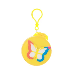 Mini portable folding hairbrush with mirror, cute butterfly design, compact travel comb.