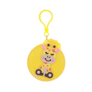 Portable folding mirror and comb compact featuring a cute yellow giraffe cartoon design keychain.