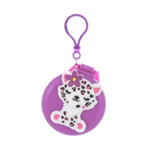 Portable purple folding hair brush with compact mirror and cute cartoon animal keychain.