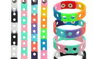 Multicolor silicone snap bracelets with metal buttons and holes for DIY shoe charm accessories.