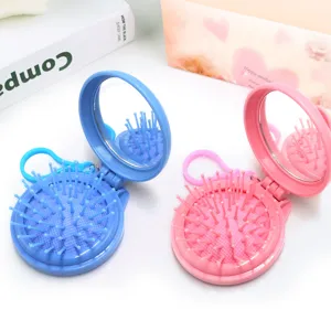 Brosse à cheveux ronde et pliable portable avec miroir, mini peigne de maquillage de voyage mignon.