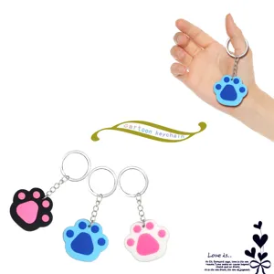 Cute cartoon animal paw silicone keychain for pet lovers, keys and fun party gifts.