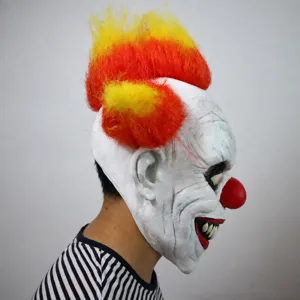Halloween scary clown mask with vibrant orange and red hair, creepy design for party props.