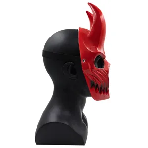 Detailed side view of the red PVC devil demon mask with horns and aggressive teeth style.