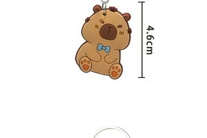 Joli porte-clés pendentif capybara de dessin animé avec un nœud papillon bleu pour sac.