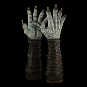 Detailed shot of scary demon zombie monster claw hands with leather cuffs for Halloween.