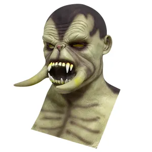 Detailed close-up showing the intricate texture, sharp tusks, and creepy design of the monster mask.
