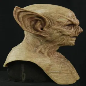 Halloween yellow goblin demon mask detail, realistic creepy latex monster headwear prop.