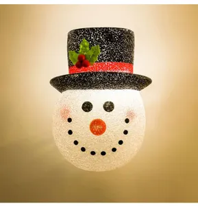Detailed shot of Christmas snowman wall light lampshade with glowing effect and cute top hat.