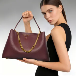 Elegant burgundy leather tote bag with gold chain and V logo for women daily commute work.