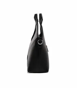 Side view detail of black leather tote bag, showing structured outline and durable design.