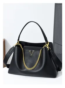 Black leather top handle shoulder bag with gold chain and V logo, large capacity daily commuter bag.