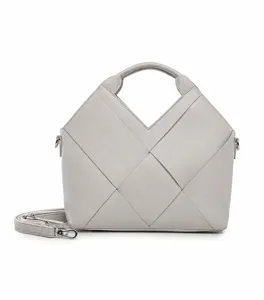 Detailed view of the elegant light gray woven leather tote bag with stylish V-cut top handle.