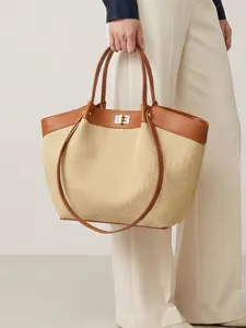 Elegante borsa tote in paglia e pelle color-block da donna, borsa a mano minimalista versatile.
