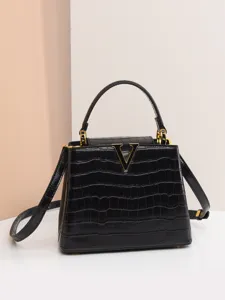 Sac à main en croco noir, sac à main minimaliste élégant avec fermoir doré en V pour femmes.