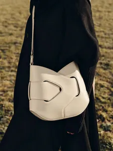 Stylish asymmetric design shoulder bag for women, chic beige cross body bag with fold detail.