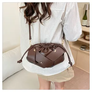 Brown faux leather crossbody bag with chic woven cloud design and stylish daily commute use.