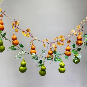 Artificial gourd vine hanging decor, lifelike fake fruit plants for wall and autumn home party display.