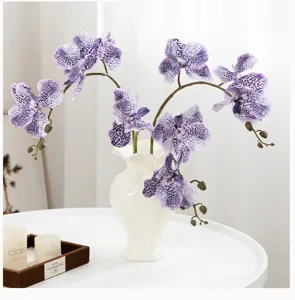 Fausse orchidee Phalaenopsis branche de fleurs tachetees violettes pour mariage deco
