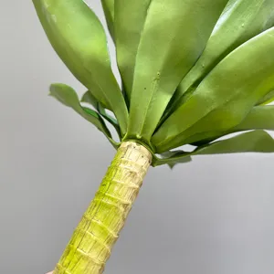 Artificial agave plant detail green leaf simulation botanical decor foliage macro shot trunk closeup