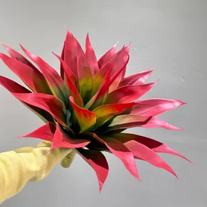 Close-up detail of artificial red and green agave plant leaf bouquet for floral arrangement