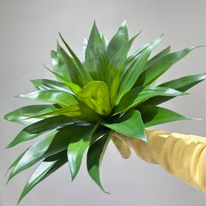 Artificial agave plant leaf detail showing lush green layers, ideal for interior floral arrangements.