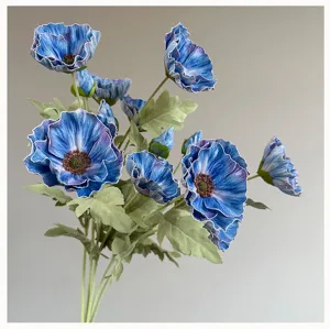 Bouquet de fleurs de coquelicot artificielles bleues pour décoration d'intérieur.