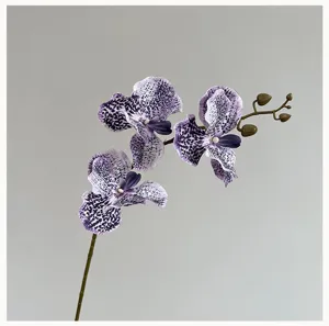 Branche d'orchidée artificielle tachetée violette pour décoration maison et mariage floral.
