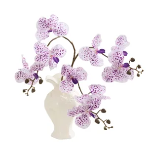 Fausse orchidée phalaenopsis artificielle en vase céramique blanc pour déco de maison.
