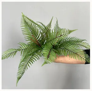Artificial fern plant fronds for micro landscape greening indoor home decor detail view.