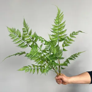 Artificial Boston fern leaves for home decor, green plant branches for landscaping and floral design.