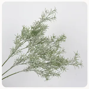 Artificial rosemary frosted green plant branch detail shot for floral arrangement decor.