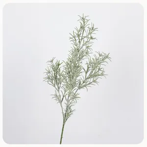 Artificial flocked green plant branch, detail close-up for floral arrangement decoration.