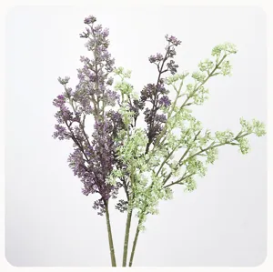 Detailed close-up of artificial purple and green berry branches, floral arrangement.